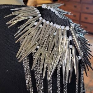 Spiked sholder pads